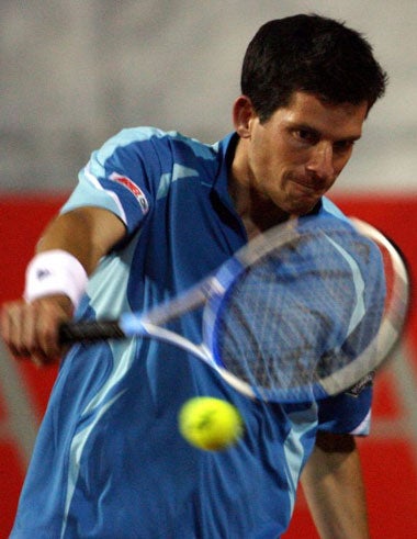 Henman (above) and Rusedski both won their second-round matches in the Rome Masters