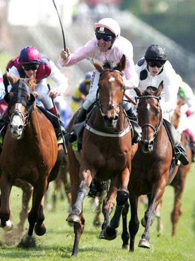 John Egan celebrates his Chester Cup victory aboard Admiral