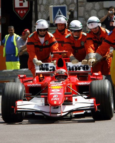 Schumacher is pushed back to the pits after a mistake at the end of qualifying in Monte Carlo