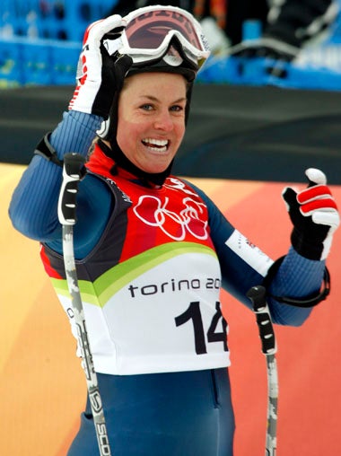 Alcott is delighted to finish 11th in the down-hill at the Winter Olympics in Turin last year