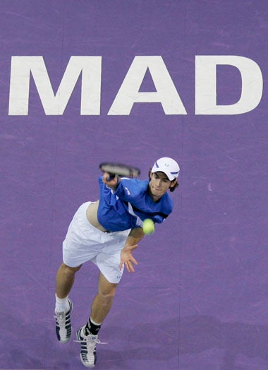 Murray serves during his defeat to local hero Rafeal Nadal