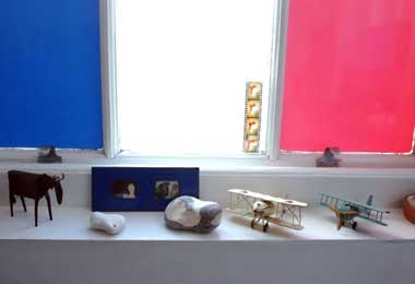 Bright window colours give an added dimension to Ella's rooms