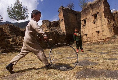 The focus is on Gross National Happiness in Bhutan
