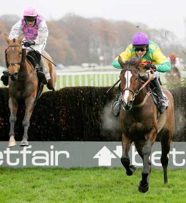 Kauto Star - ridden by Sam Thomas - leads over the last