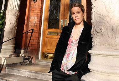 Above: Lucy Russell of Quintessentially Estates, which sells properties such as this grand townhouse inEarl¿s Court Square in South Kensington, London. The house measures a huge 5,450sq ft and includesa ballroom and five bedrooms. It is on sale for £6.75m