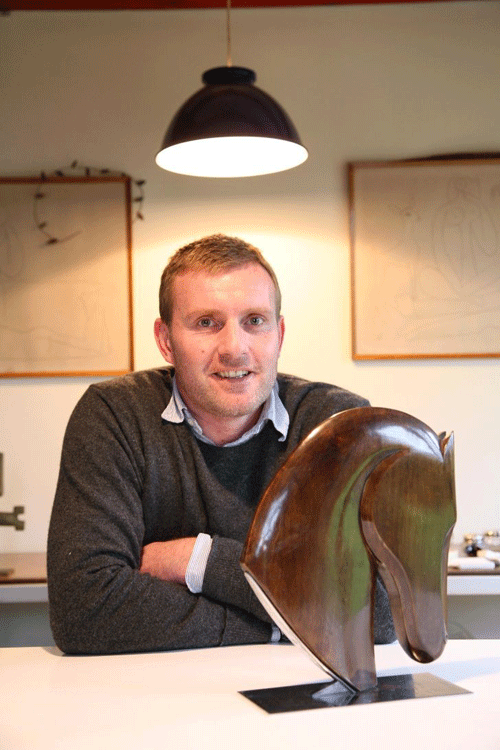 Simon Alderson with a horse-head sculpture from Time Capsule © John Lawrence