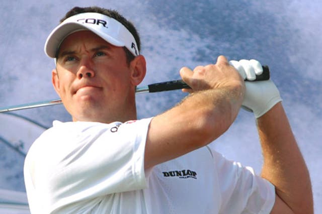 Westwood tees off on the 16th hole during the Qatar Masters