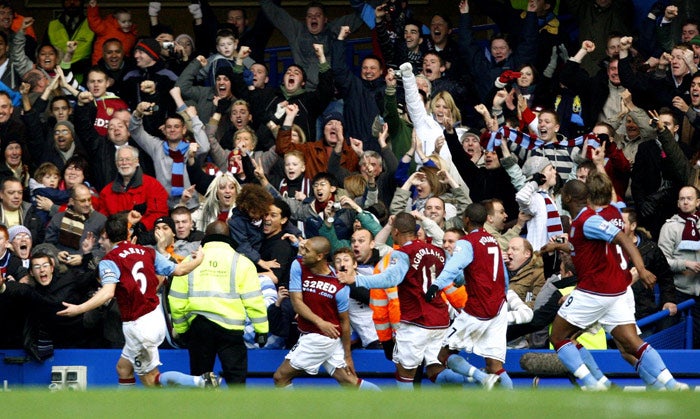 Gareth Barry (left) celebrates with Aston Villa supporters after scoring against Chelsea