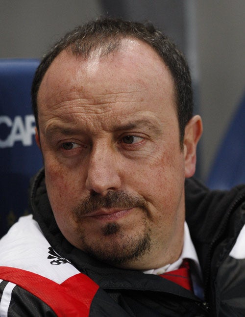 Liverpool fans have thrown their support behind manager Rafael Benitez despite his team's under-achievements