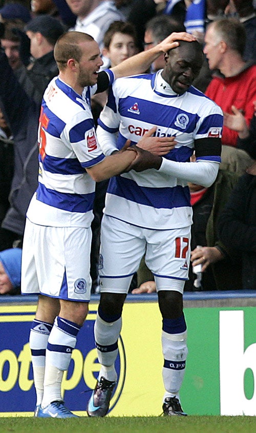 Rowan Vine gives fellow striker Patrick Agyemang a pat after his opening goal for QPR