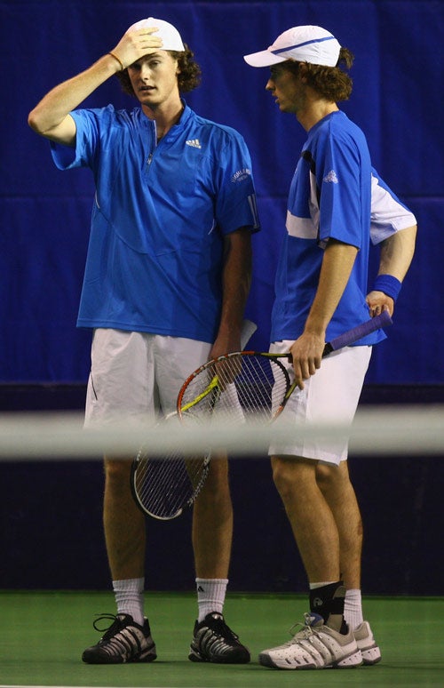 Jamie Murray (left) is disappointed his brother Andy (right) decided not to play in the Davis Cup