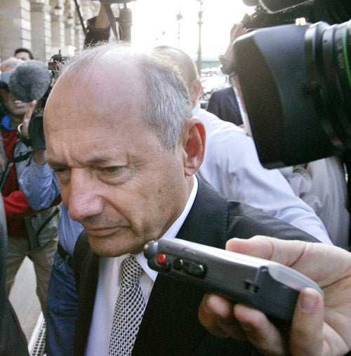 Ron Dennis arrives at the FIA in Paris for the original spy scandal hearing in September