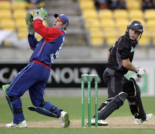 Wicketkeeper Phil Mustard and NZ batsman Jamie How during England's heavy defeat in Wellington