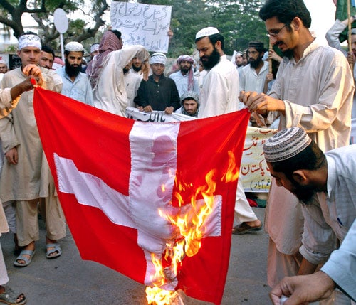 A Danish flag is burnt at protests in 2006
