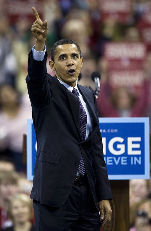 Mr Obama's victory rally in Wisconsin saw him surrounded by a sea of multiracial supporters waving banners and cheering his now-familiar punch-lines