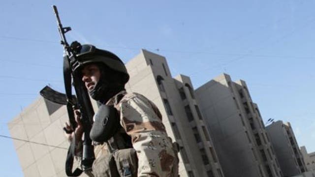 An Iraqi soldier mans a checkpoint in Baghdad © AFP/Getty Images