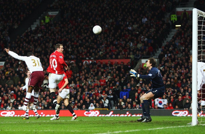 Rooney opens the scoring with an early header as United turn on the style to knock Arsenal out of the FA Cup