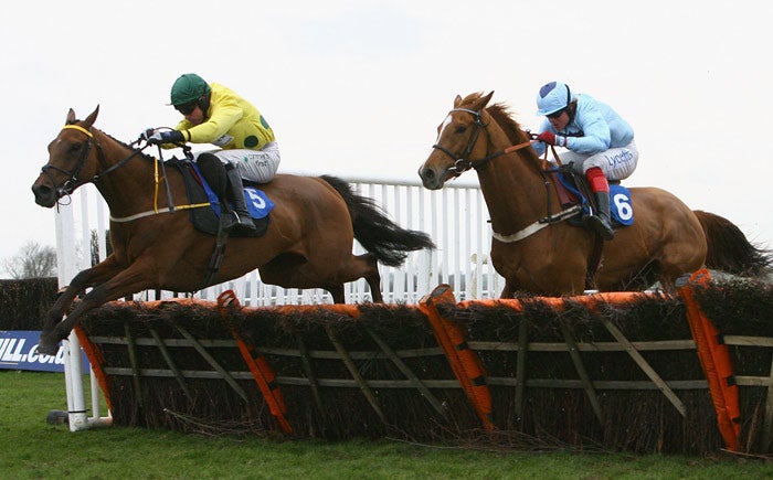 Hold Em jumps the last in front before victory at Huntingdon yesterday