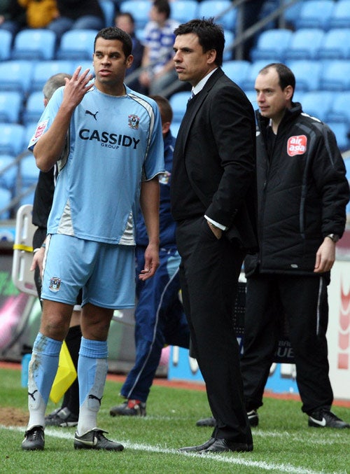 New Sky Blues' manager Chris Coleman talks tactics with defender Marcus Hall