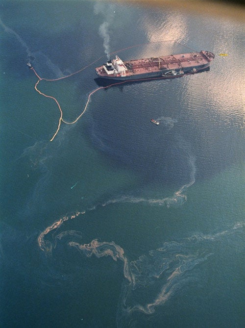 Crude oil spilling into Prince William Sound from the Exxon Valdez in 1989