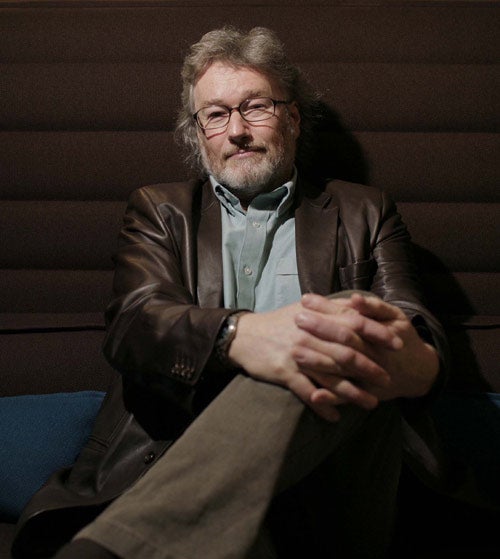 The new and fashionable post-mid-life crisis Iain Banks: wearing his new Nicole Farhi brown leather box jacket ... and loving the feel of it