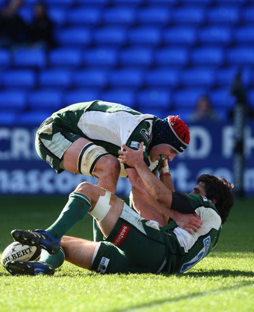Nick Kennedy, of London Irish, congratulates Gonzalo Tiesi, whose try helped the Exilesdefeat Saracens