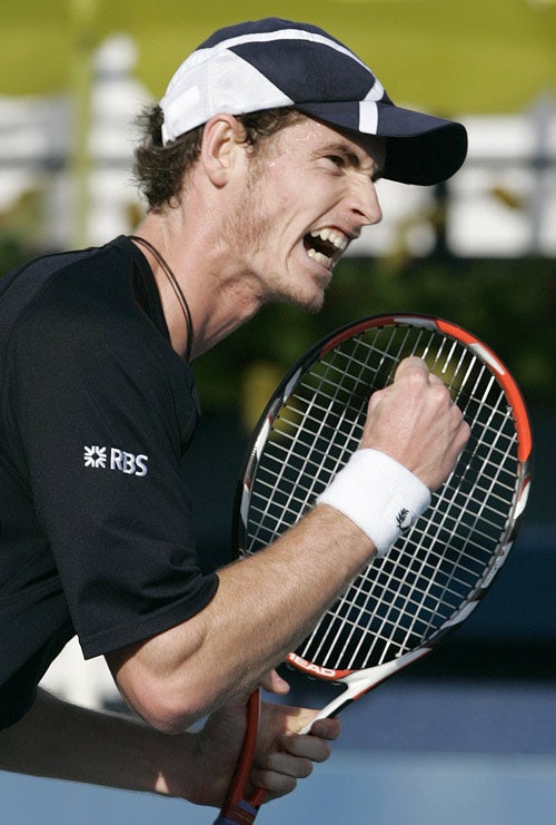 Murray celebrates his 6-3, 3-6, 7-6victory against Spain's Fernando Verdasco in the second round of the Dubai Championships