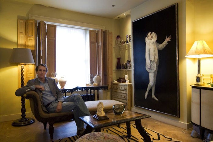 Marc Weaver with the painting he inherited from his mother; part of his ivory collection © Michael Franke