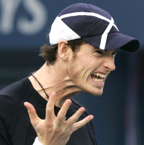 Murray expresses his frustration during a 7-5, 6-4 defeat against Russian Nikolay Davydenko in Dubai
