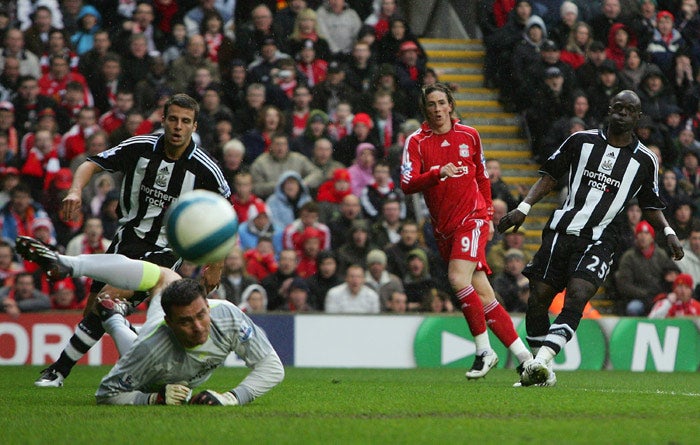 Liverpool striker Fernando Torres fires home during the 3-0 victory over Newcastle at Anfield