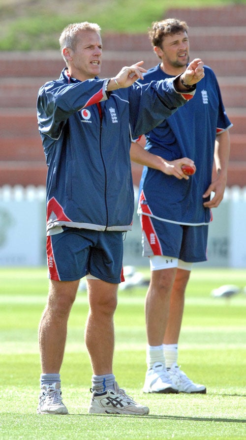 The England coach, Peter Moores, directs training yesterday prior to the second Test while the fast bowlerStephen Harmison, who performed poorly in the first Test and may be dropped, looks on