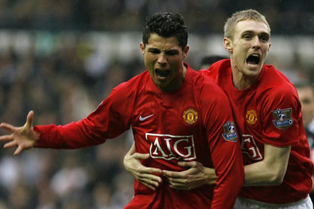 Ronaldo (left) celebrates his winning goal with team mate Darren Fletcher