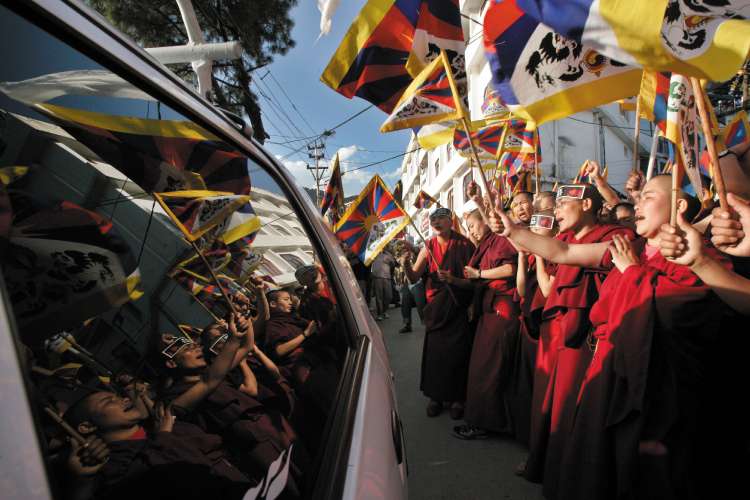 Exiled Tibetan Buddhist clerics chant anti-Chinese slogans in Dharamsala, India, yesterday
