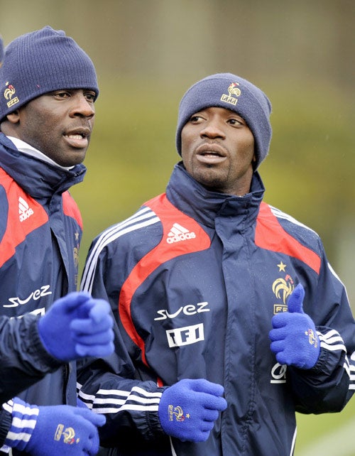 Lilian Thuram (left) and Claude Makelele are two elder statesmen splitting French opinion, eitherpropping up the reign of Raymond Domenech or stalling youngsters' development
