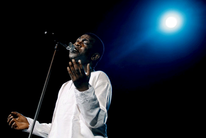 Furious energy: Youssou N'Dour's singing is a rhythmic device as much as an emotional force © EPA