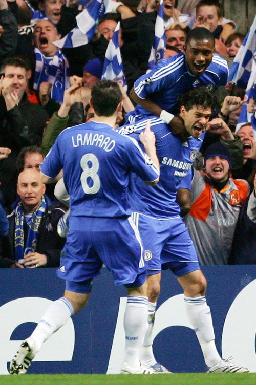 Chelsea players celebrate Michael Ballack's goal at Stamford Bridge last night