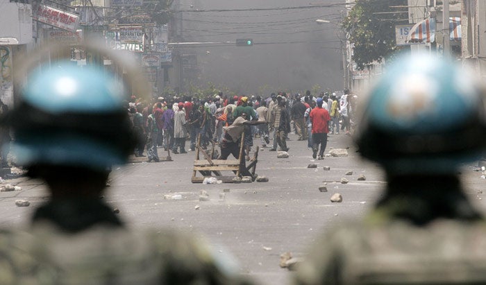 Haitians protesting against the rising price of basic foods turn their anger on UN peacekeepers in the capital, Port-au-Prince, yesterday