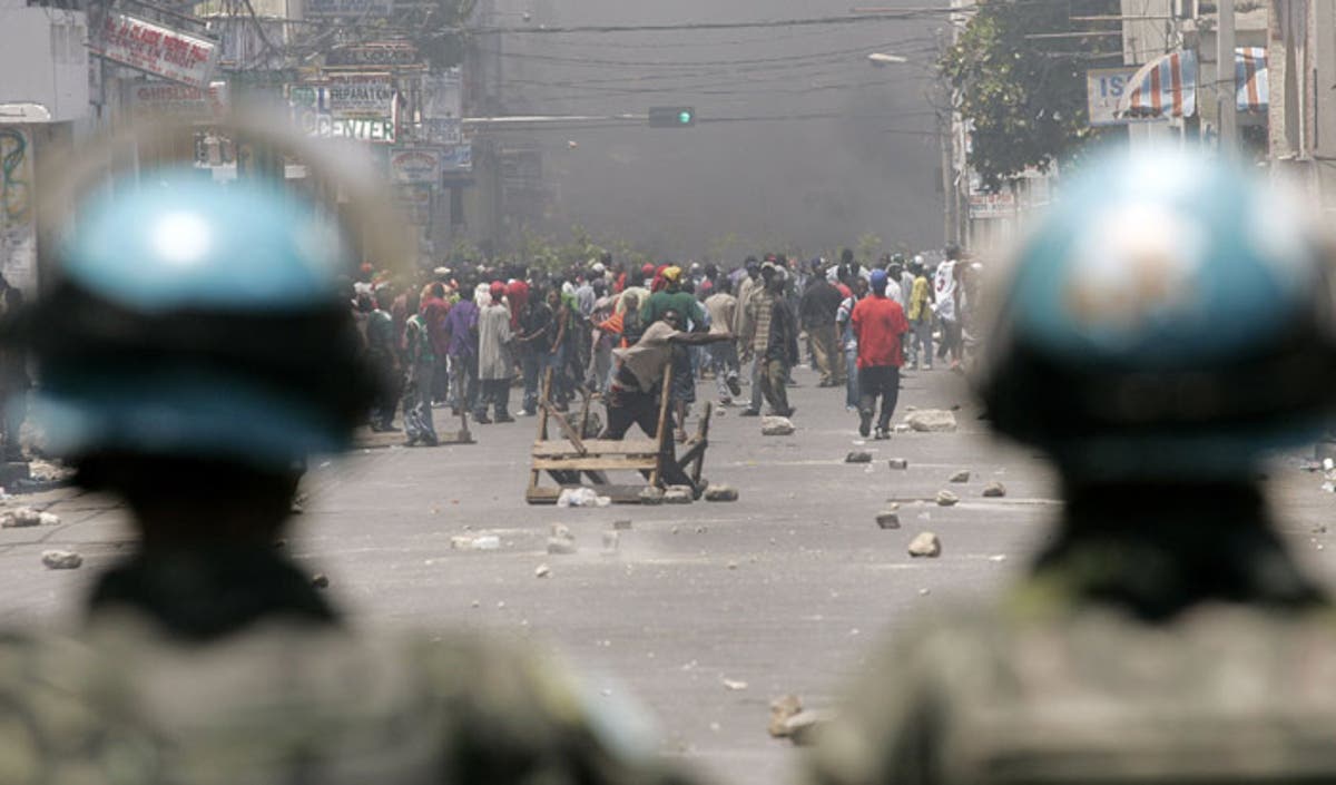 Starving Haitians riot as food prices soar | The Independent | The ...