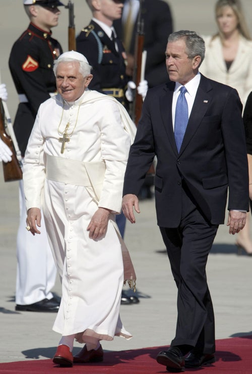 President Bush escorts Pope Benedict XVI upon his arrival at Andrews Air Force Base in Maryland