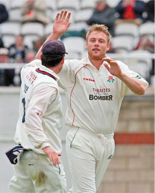 Andrew Flintoff celebrates taking the wicket of Scott Newman on his return from injury yesterday