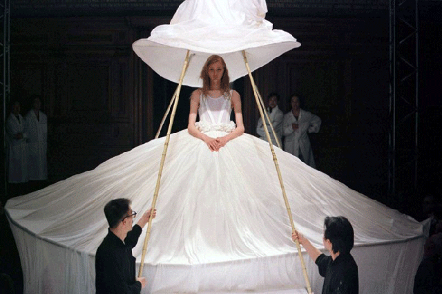 Yohji Yamamoto's wedding dress demonstrates the designer's experimentation with space and volume © Catwalking.com