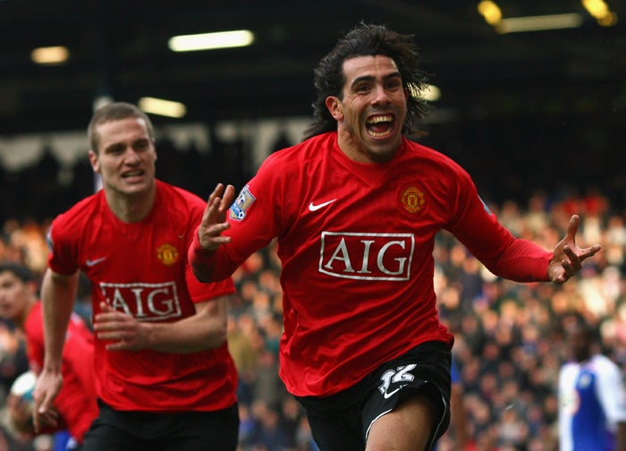 Joy unconfined for Carlos Tevez (right) after his late header earned a point and leaves United three clear of Chelsea with a superior goal difference ahead of Saturday's Stamford Bridge showdown