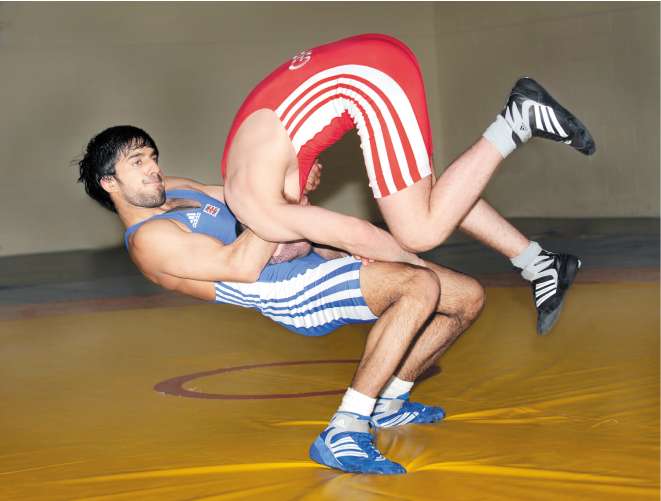 Jatinder Rakhra puts a move on an opponent at the British Wrestling Academy in Salford