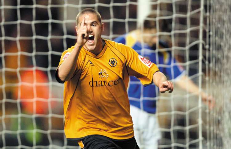 Michael Kightly celebrates after scoring Wolves' third goal last night