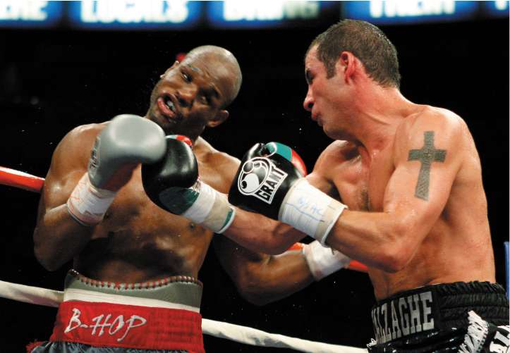 Calzaghe (right) may have a crack at Roy Jones Jnr after defeating Bernard Hopkins (left) last weekend