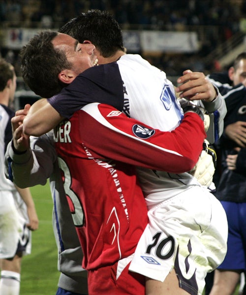 Rangers' Nacho Novo celebrates with goalkeeper Neil Alexander after victory in Florence