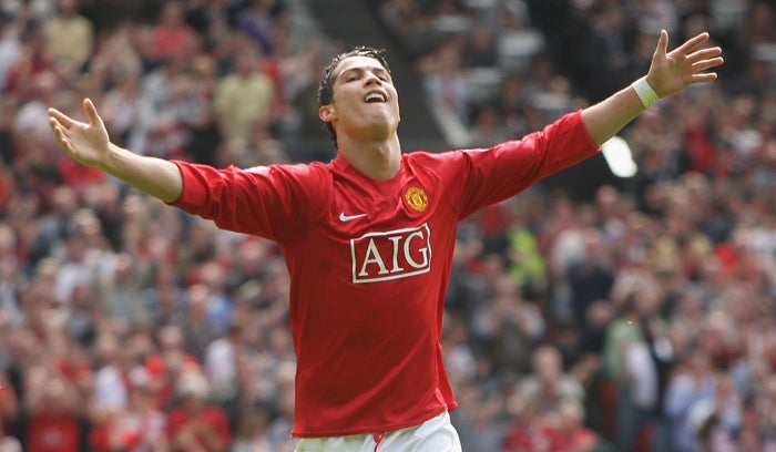 Cristiano Ronaldo celebrates after scoring his and Man United's second goal in the 4-1 thumping of West Ham which puts them in sight of a 17th League title