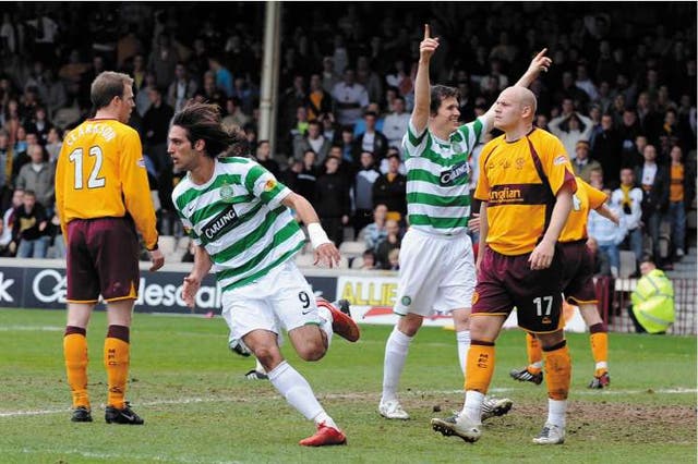 Celtic's Georgios Samaras turns away to celebrate his winning goal against Motherwell