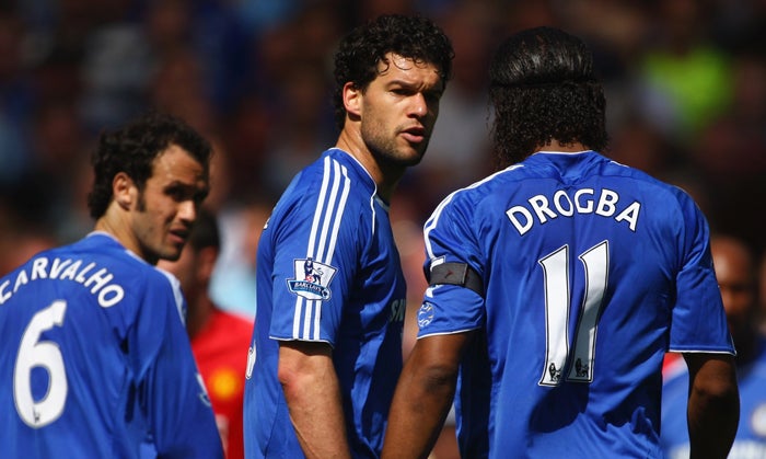 Michael Ballack and Didier Drogba argue over the taking of a free-kick against Manchester United last month