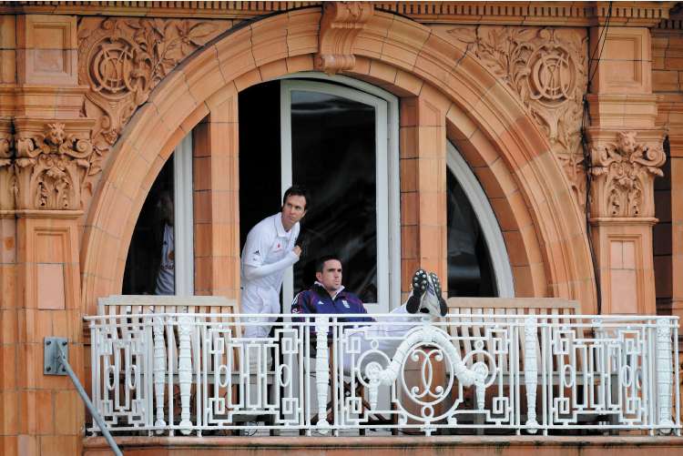 England captain Michael Vaughan looks to the heavens as Kevin Pietersen puts his feet up at Lord's